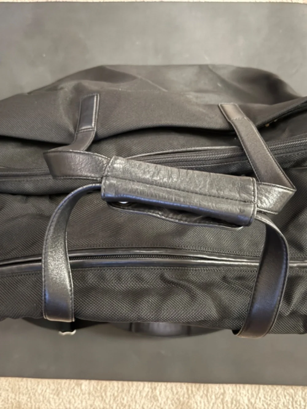 TUMI  Black Carry/Weekend Back with Leather Trim